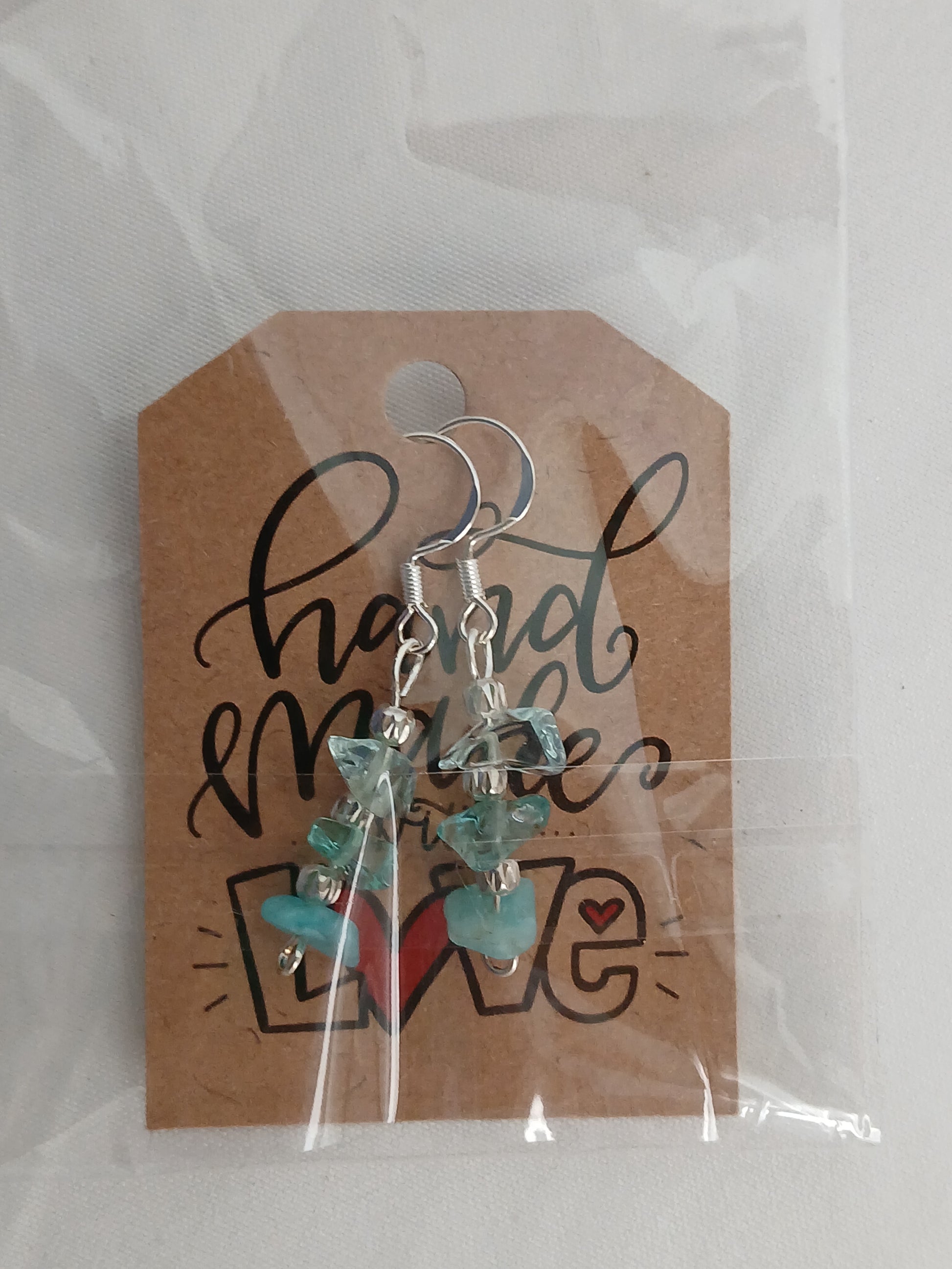 Handcrafted earrings with blue topaz and rock crystal, premium 925 sterling silver