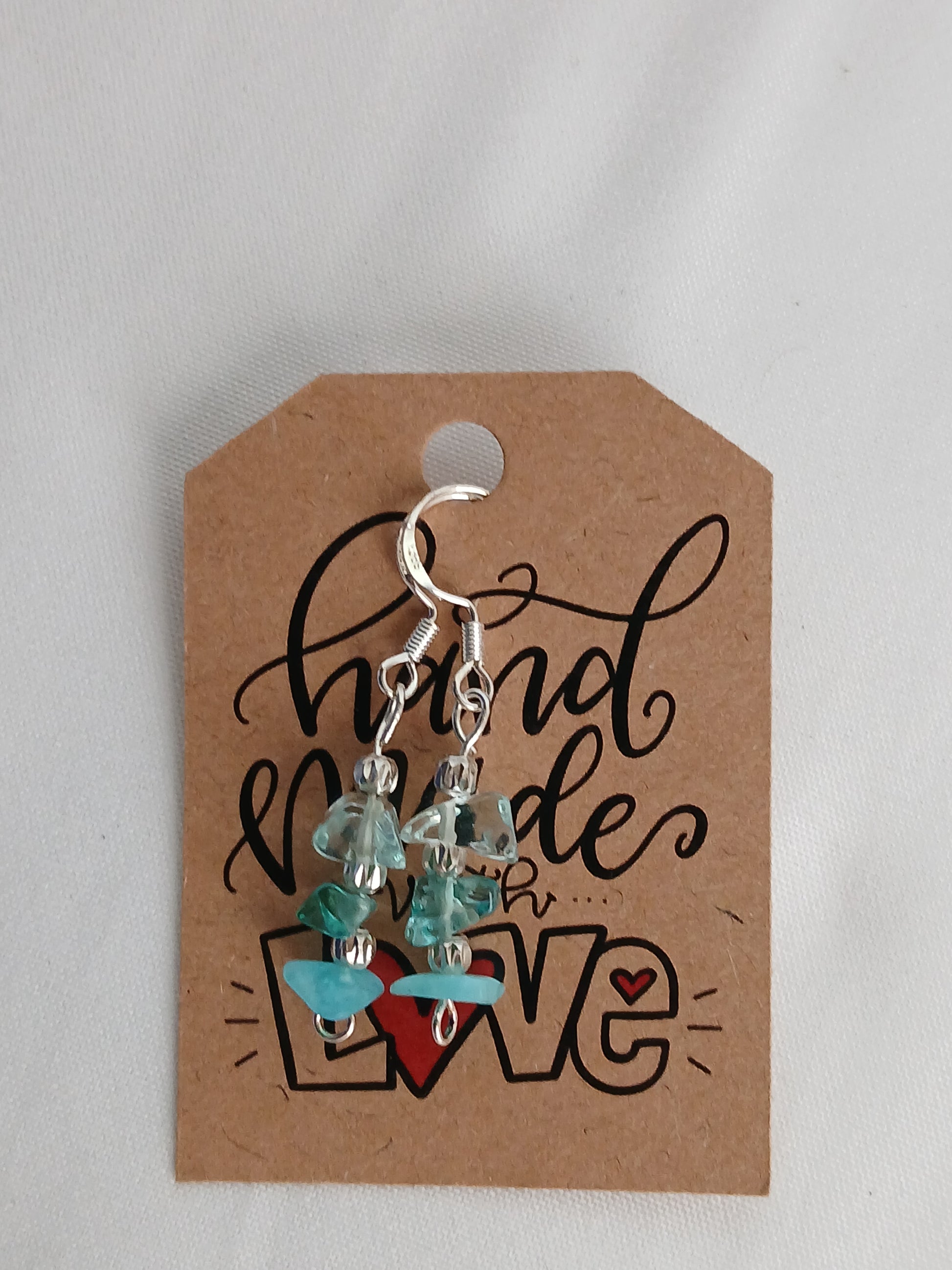 Handcrafted earrings with blue topaz and rock crystal, premium 925 sterling silver